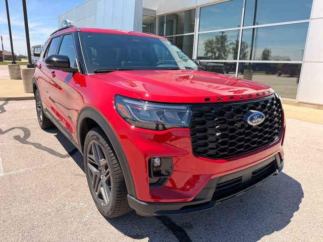 2026 Ford Explorer ST-Line in Rapid Red Metallic Tinted Clearcoat — front three-quarter view