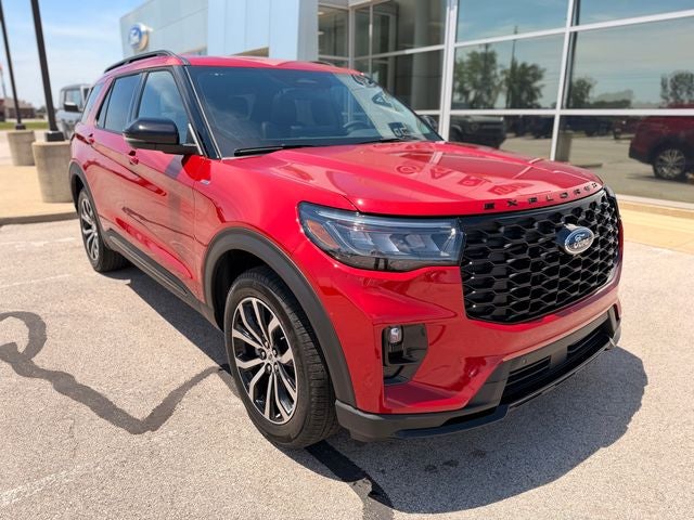 2026 Ford Explorer ST-Line in Rapid Red Metallic Tinted Clearcoat — front three-quarter view